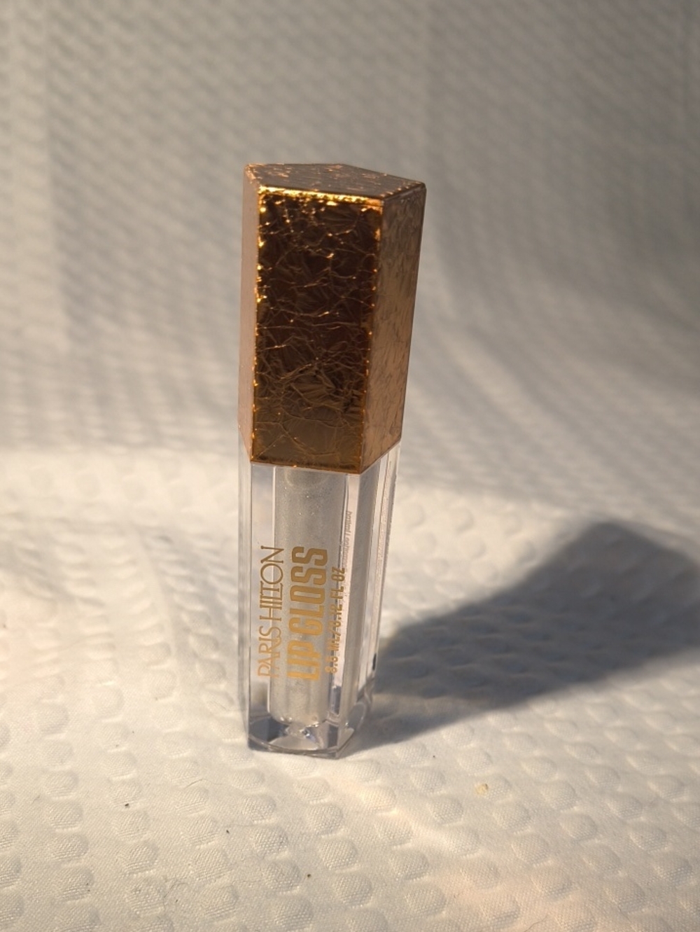 Paris Hilton Clear Lip Gloss with Textured Gold Cap